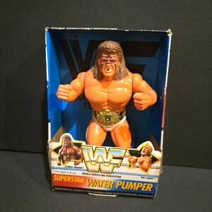 NEW WWF WORLD WRESTLING ULTIMATE WARRIOR SUPERSTAR WATER PUMPER TOY USA IN BOX